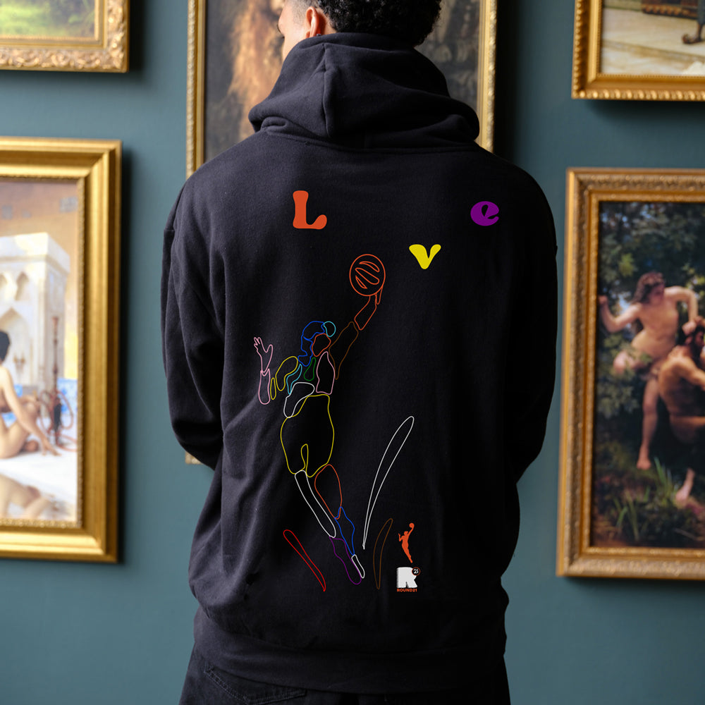 Model wearing hoodie; back view.