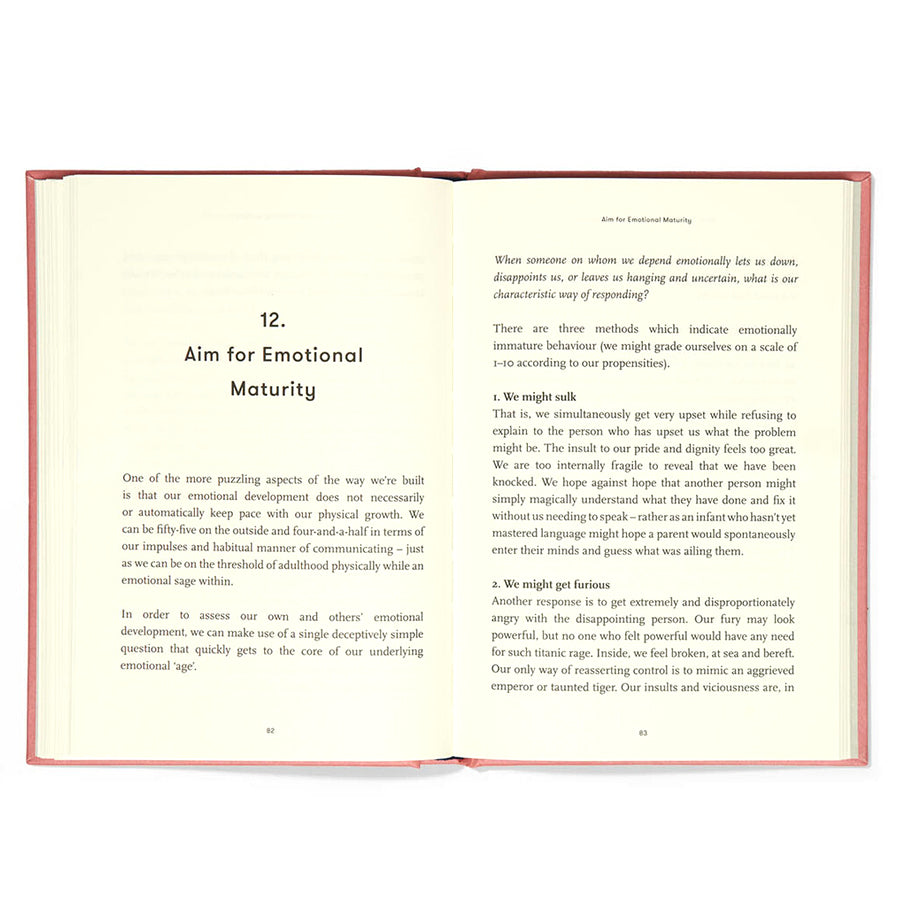 Book titled 'What They Forgot to Teach You at School' by The School of Life on a white background