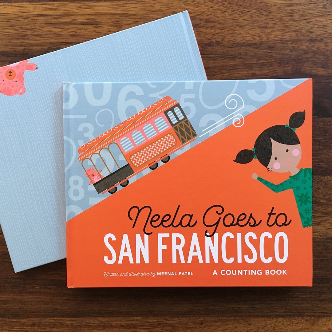 Neela Goes to San Francisco&#39;s front cover stacked on another copy&#39;s back.