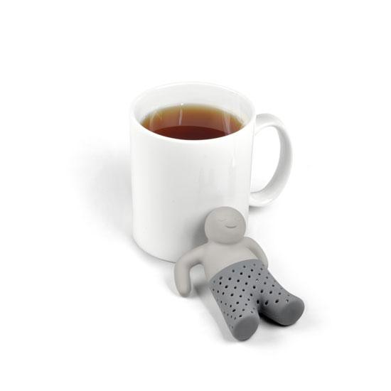 The Mr. Tea Infuser lying on a cup of tea.