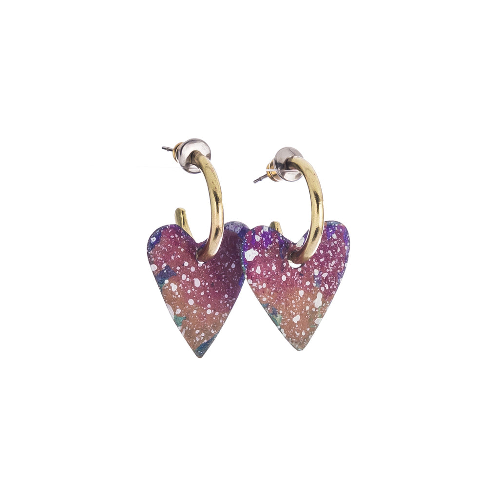 Photo of the Corazon Heart Earrings by Sibilia on white background.