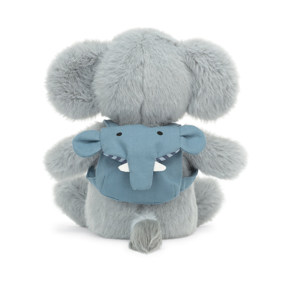 Stuffed elephant plush wearing a small elephant face backpack.