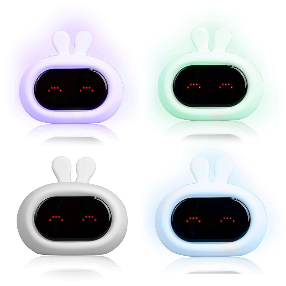 Bunny Alarm Clock lit up with different colors.