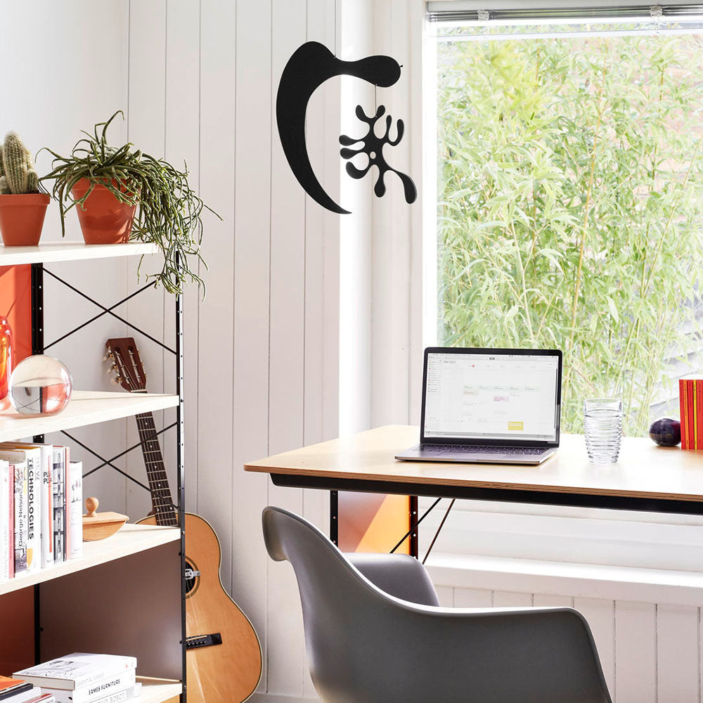 Eames Plywood Mobile: Model A in black lacquer finish hanging in home office.