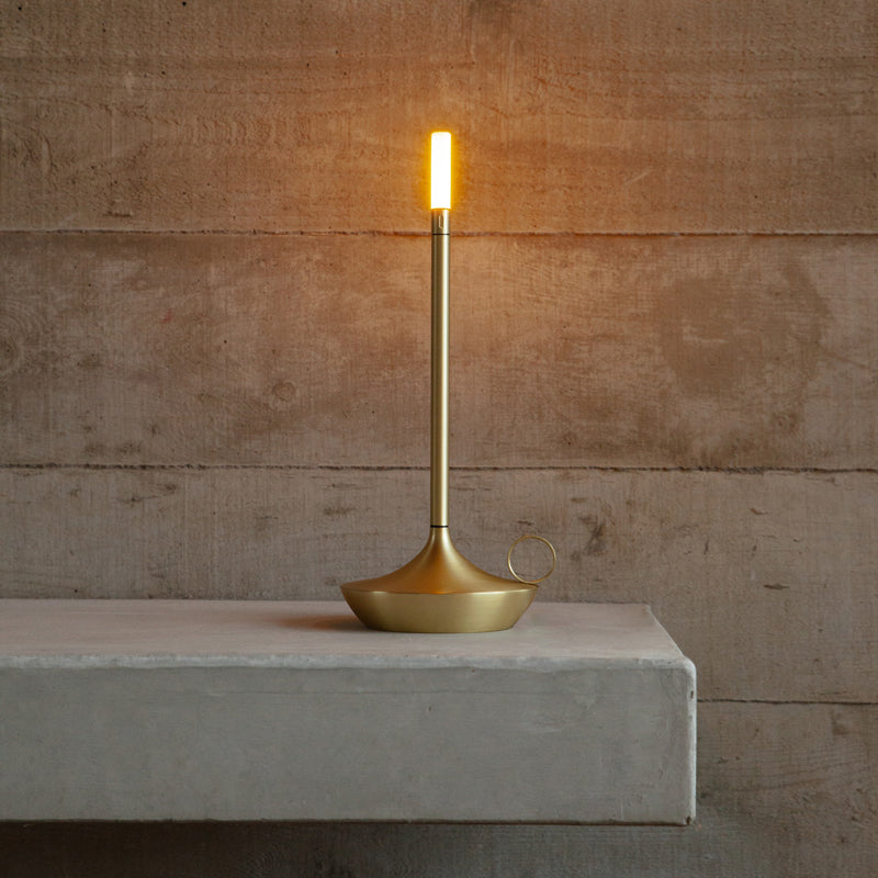 A Wick Brass Rechargeable Table Light on display.