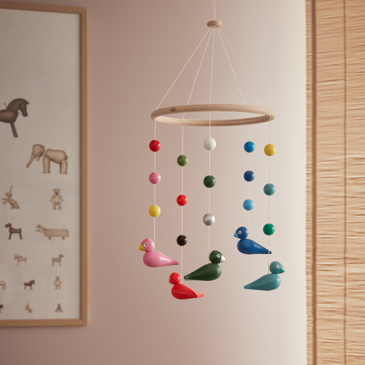 The Kay Bojesen Songbirds Mobile: Multi-color hanging in a kids room