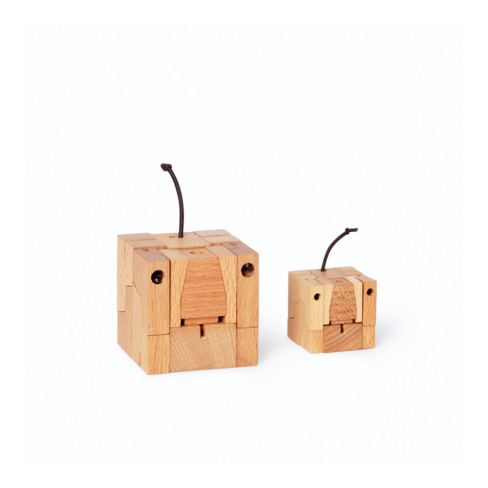 Milo The Dog Cubebot by Areaware, in natural wood color on white background.