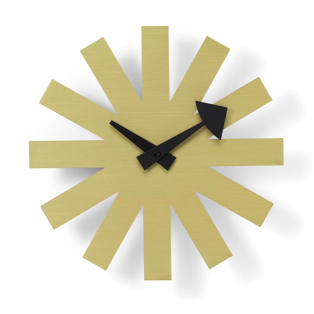 Asterisk Clock: Brass face.