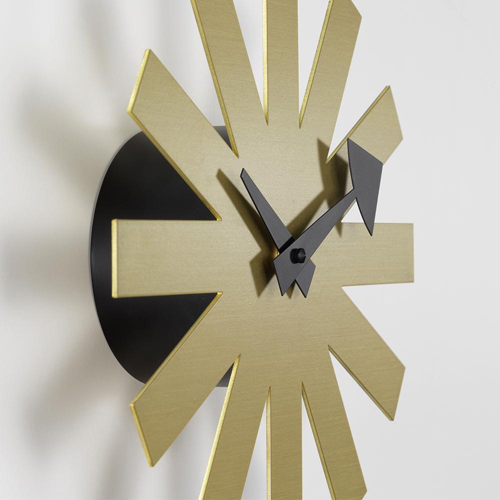 Asterisk Clock: Brass side angle.