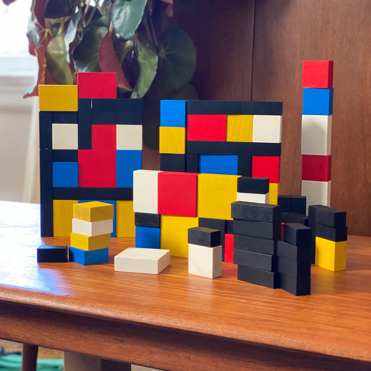 The Mondrian Blocks stacked on a table.