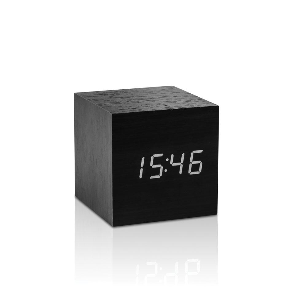 The Black Cube Click Clock on display.