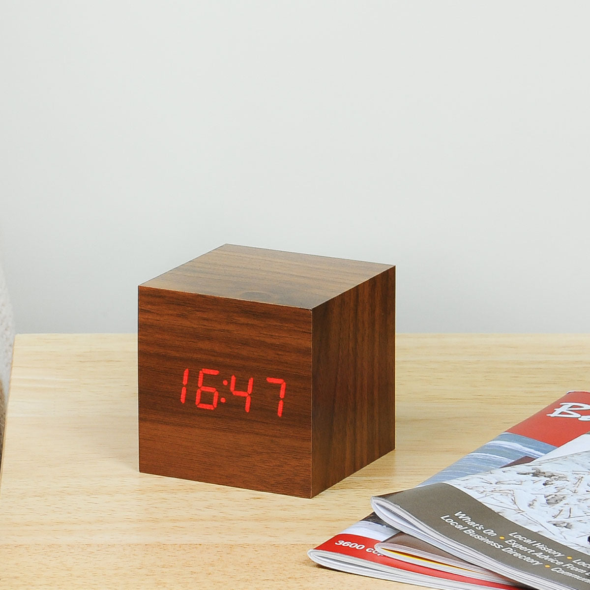 The Cube Click Clock: Walnut on a desk on its 24 hour time setting.