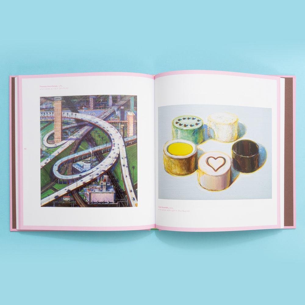 Paintings of a swirling freeway and five cakes featured in Wayne Thiebaud: Delicious Metropolis.