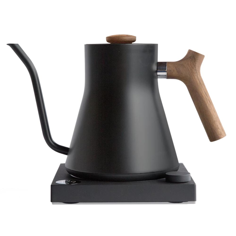 The Stagg EKG Electric Kettle: Walnut on display.
