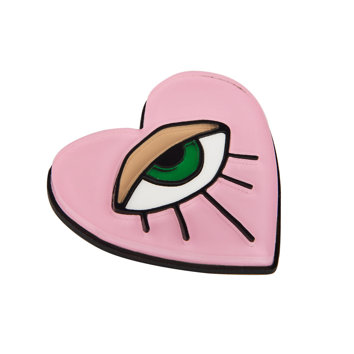 An angled view of the Eye in Heart Brooch laid flat.