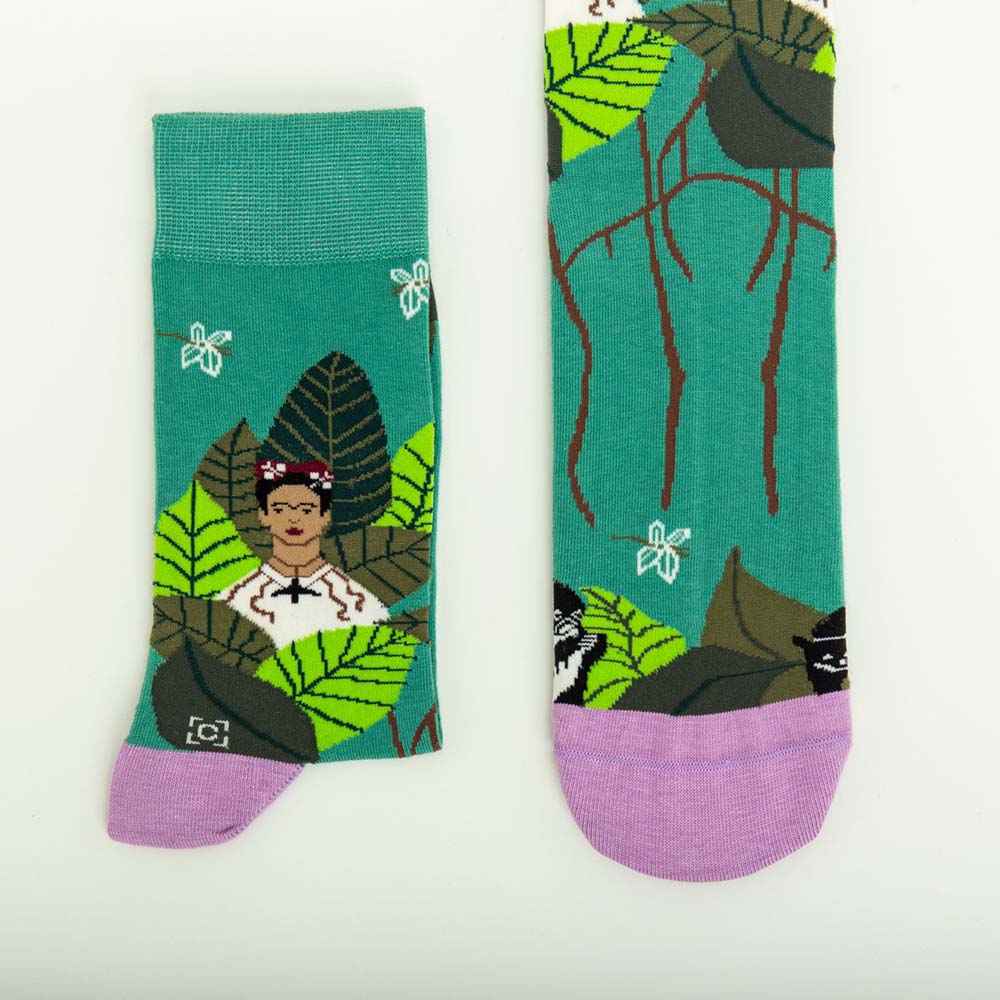Two Frida Socks displayed to show off their artwork.