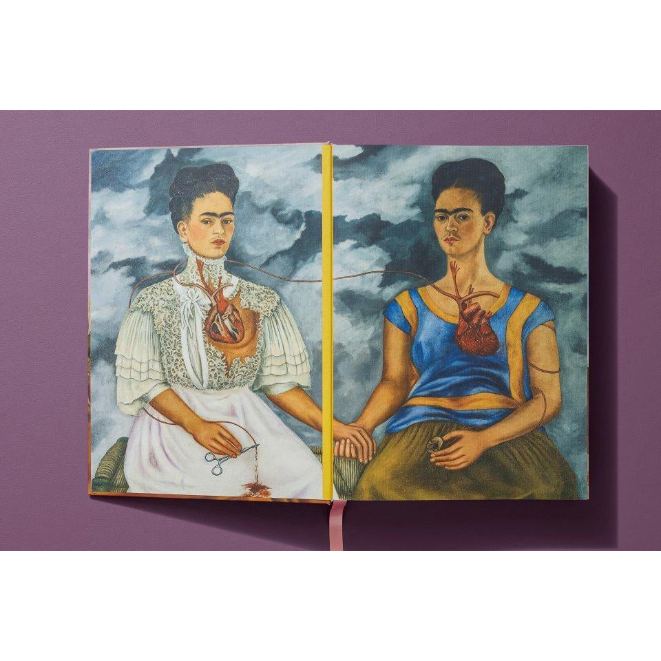 Frida Kahlo: The Complete Paintings&#39; self portrait pages.