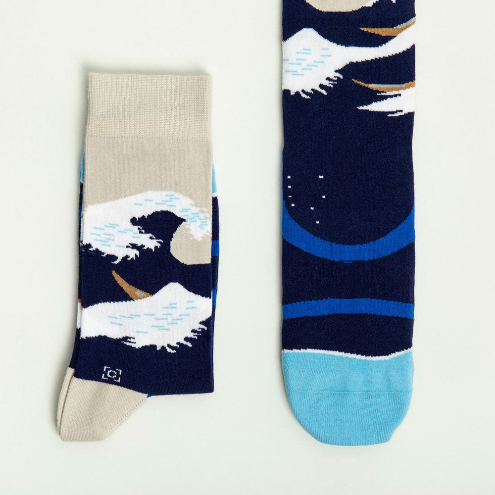 A pair of Hokusai Socks displayed to show off their artwork.