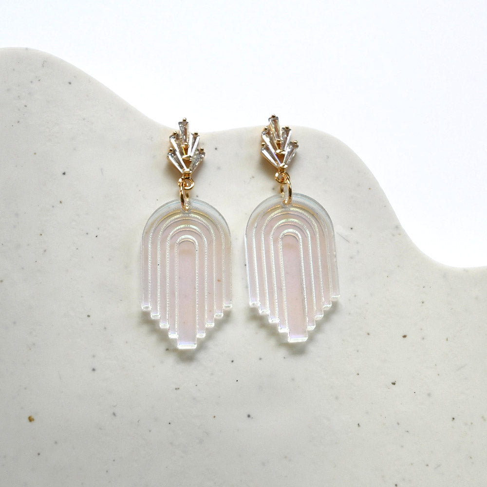 Deco Arch Earrings by Shape + Colorf on geometric stone.