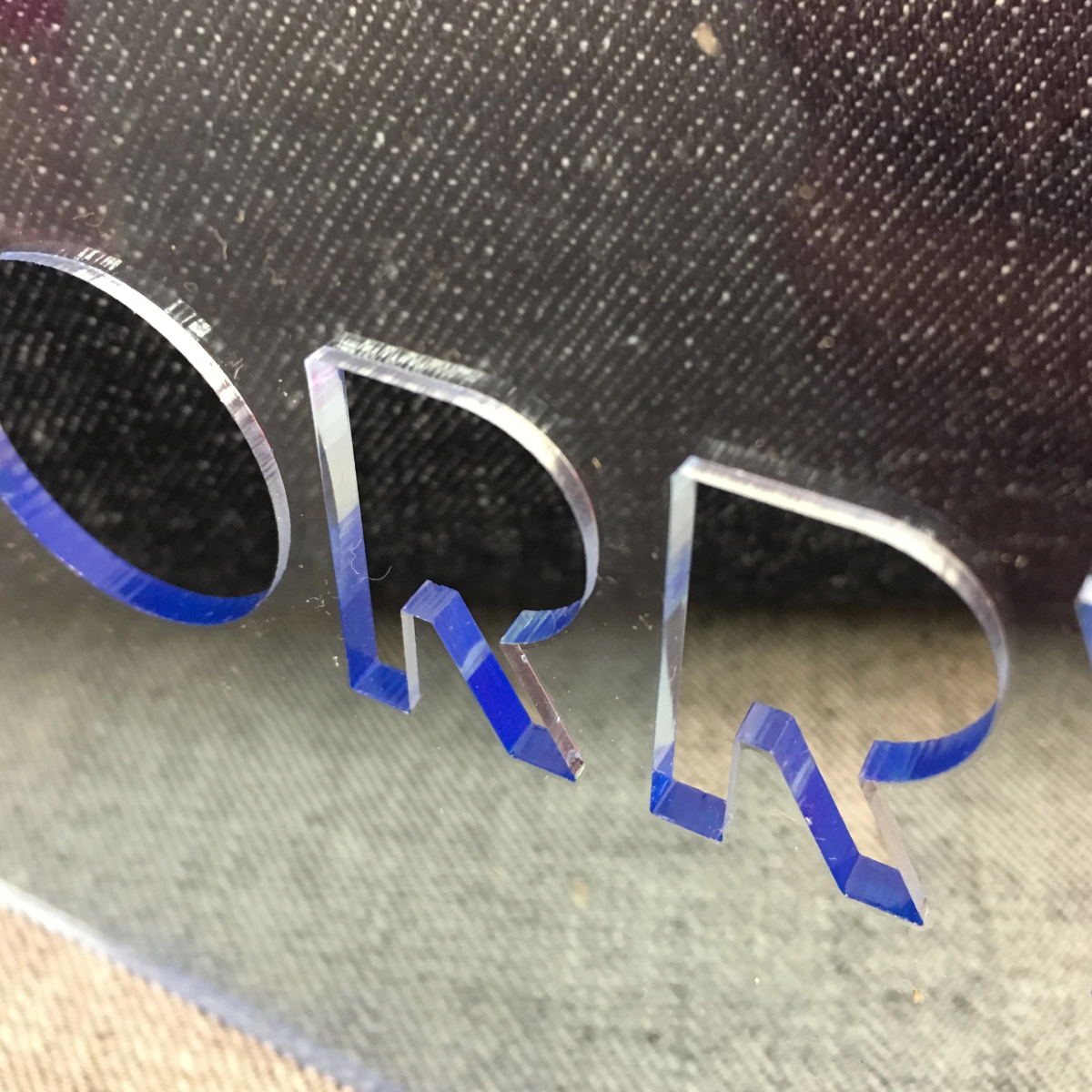 Close up of the Sorry Neon Greeting Card&#39;s letters.