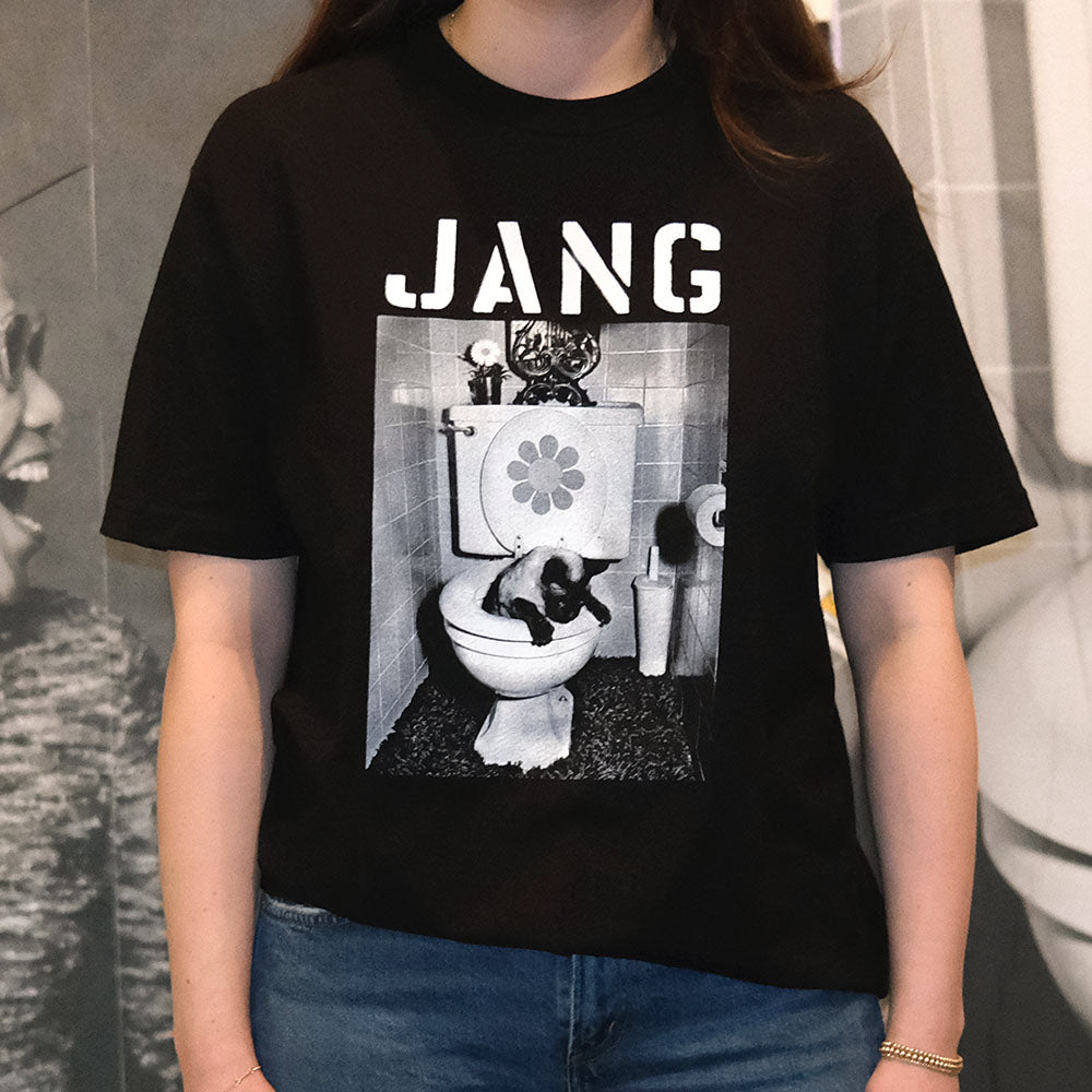 Model wearing Jang T-shirt in front of the artist&#39;s mural at SFMOMA.