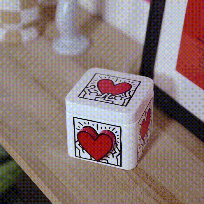 GIF of Keith Haring Lovebox in use.