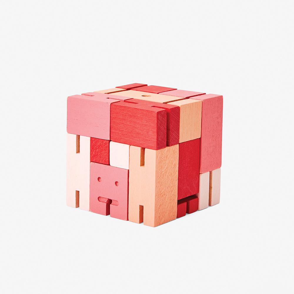 The Micro Cubebot: Red in cube form.