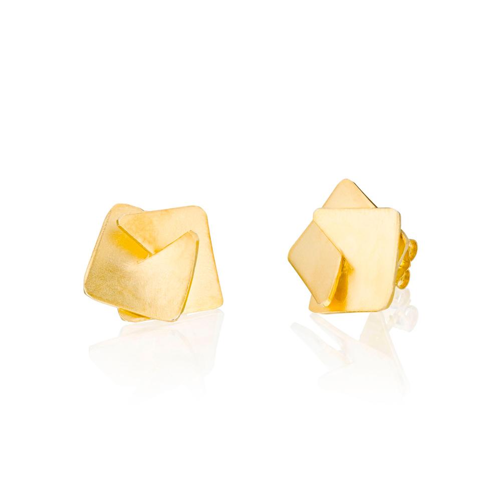 The Ravit Kaplan: Gold Origami Fold Studs on display.