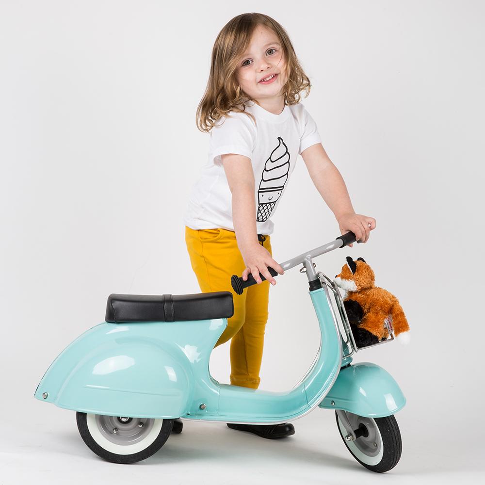 A child with a Primo Ride-On Scooter: Mint.