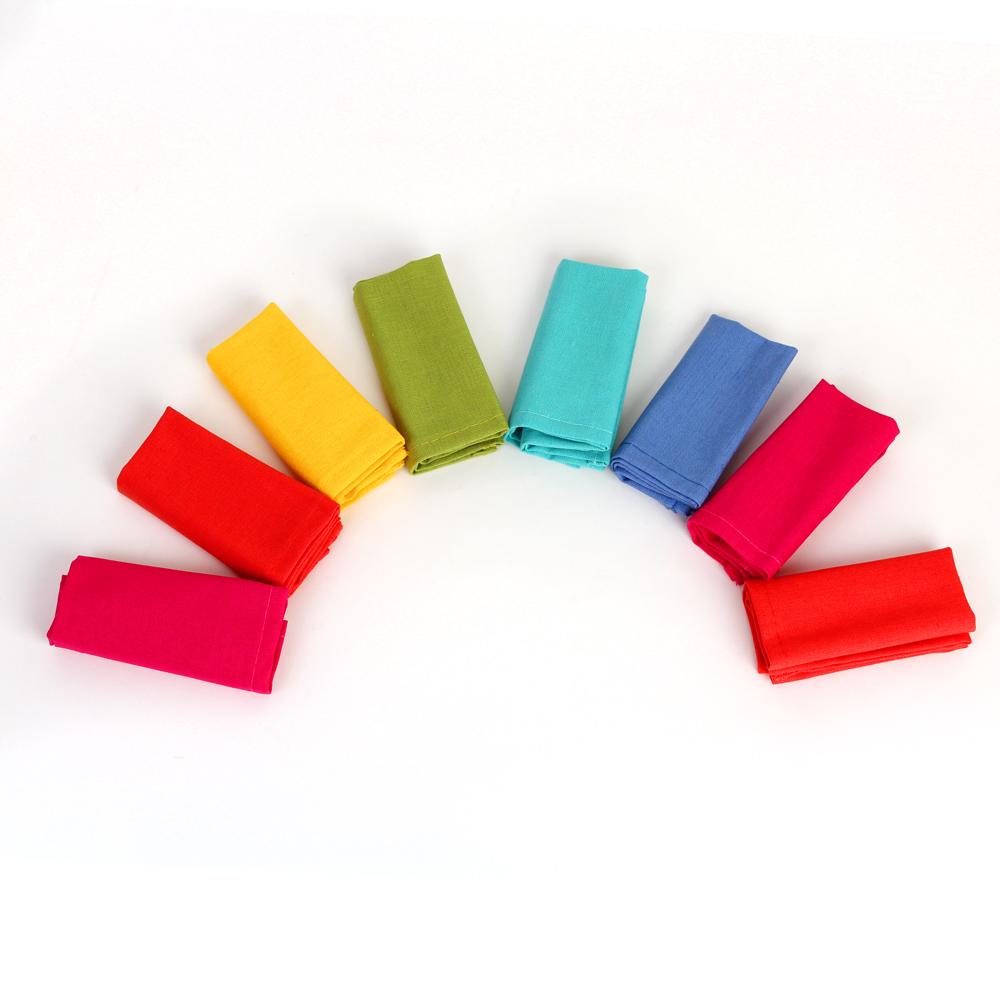 Rainbow Cocktail Napkins: Set of 8 displayed in a half circle.