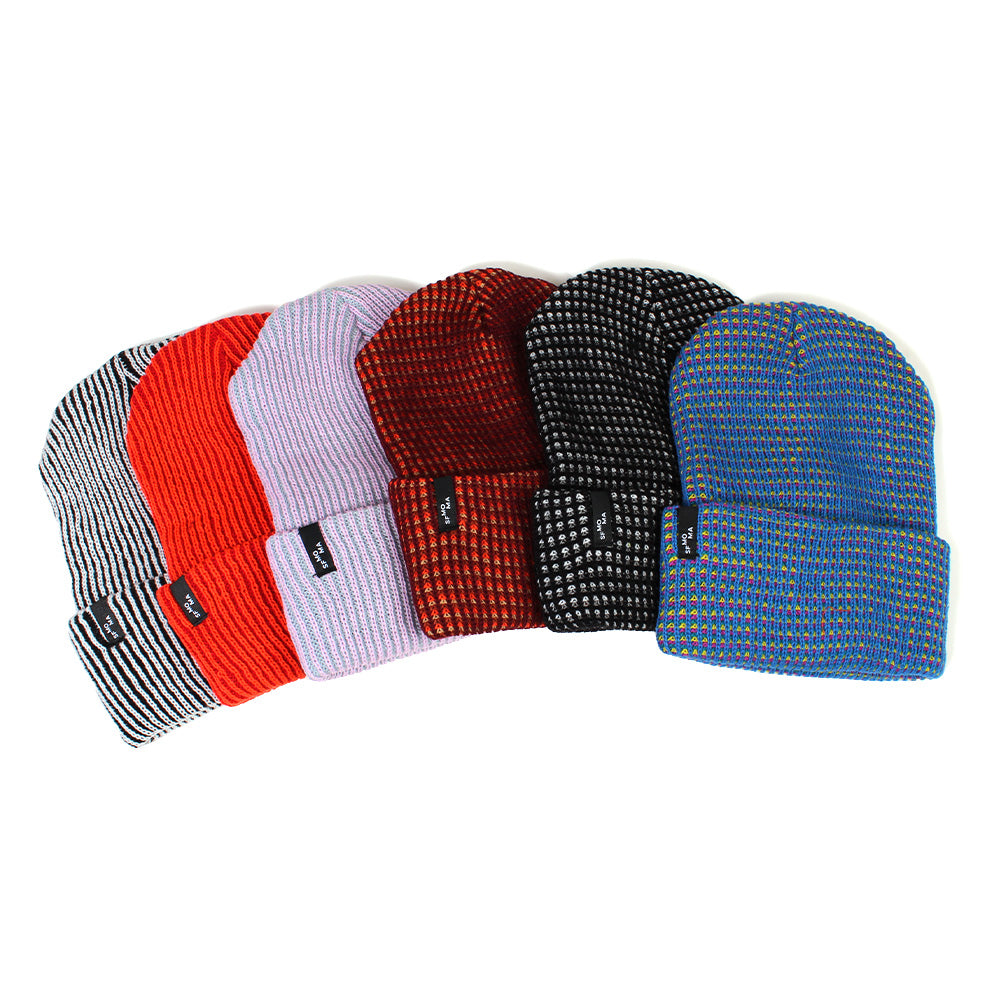 Group of different colored ribbed hats.