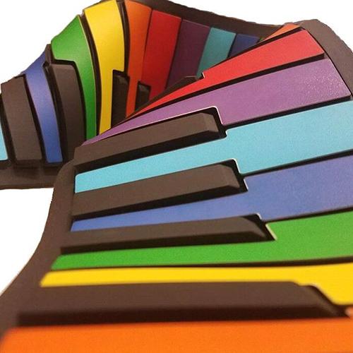 The Flexible Roll-Up Rainbow Piano partially unrolled and displayed.