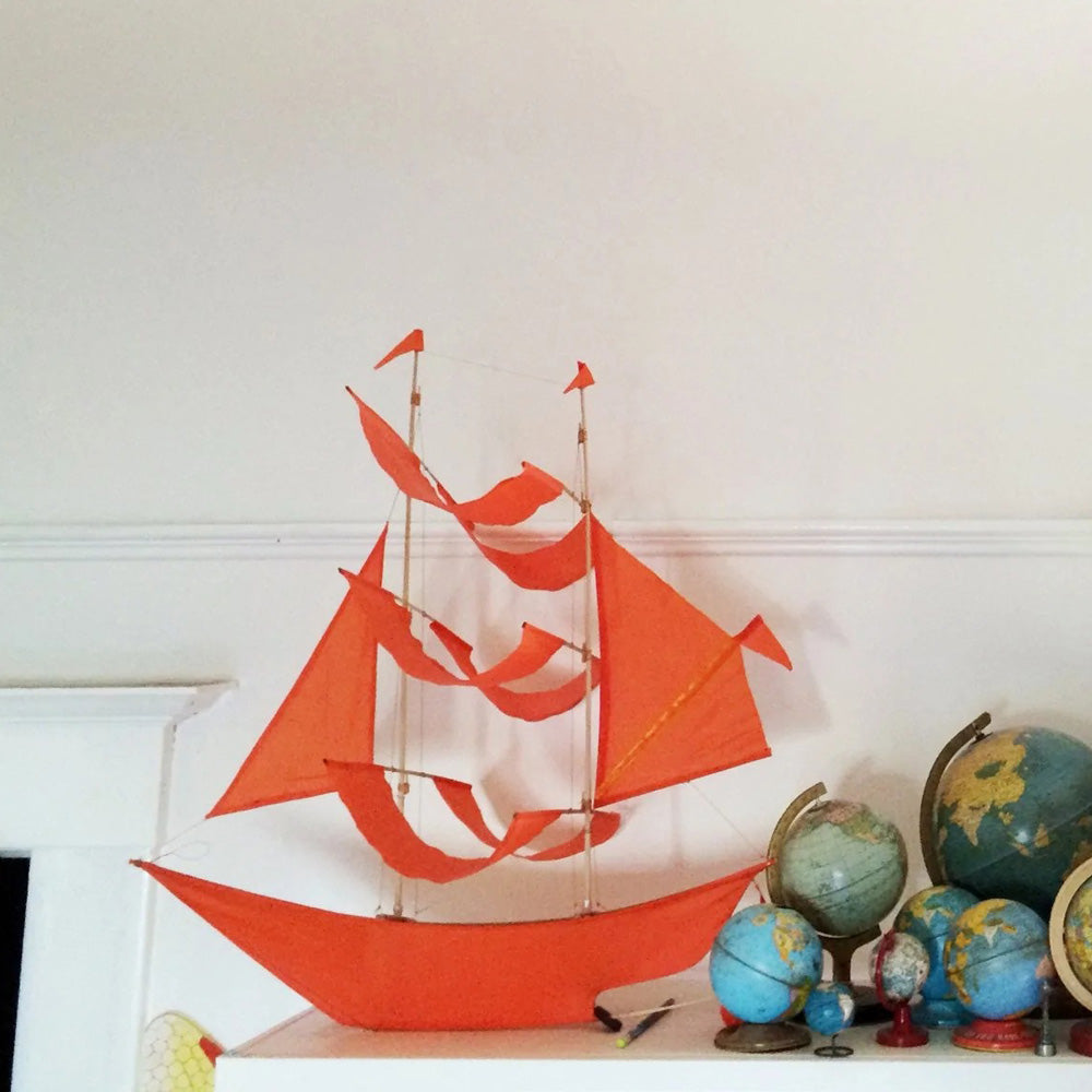 Sailing ship kite on display.