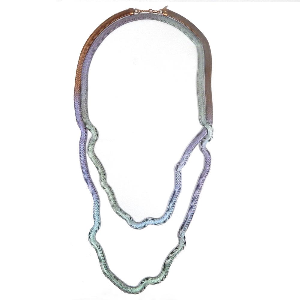 Snake Chain Necklace: Green + Gold Pearl on display.