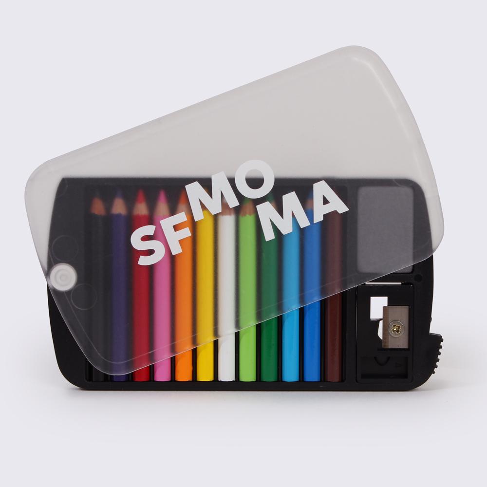 The SFMOMA Mini Pencil Set&#39;s clear plastic facing slightly opened.