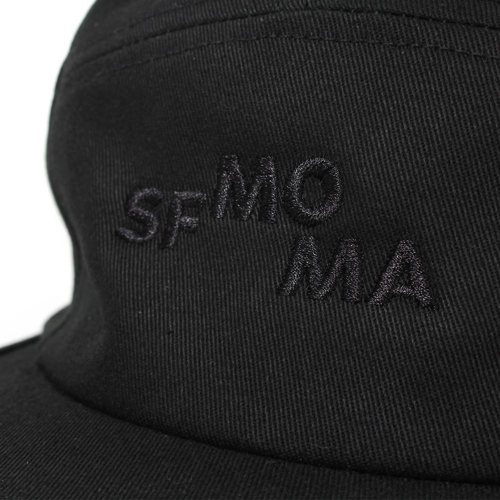 Close up of the SFMOMA Cap: Black&#39;s logo.