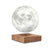 The Smart Moon Lamp: Walnut on display.