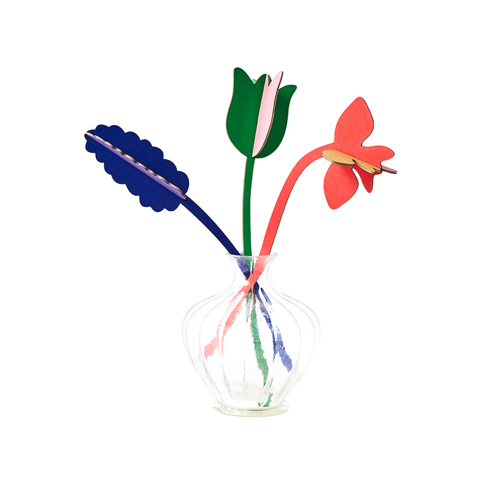 Photo of assembled Springtime Surprise flowers by Studio Roof, in glass vase on white background.