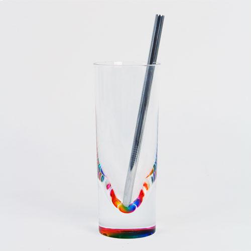The SFMOMA Stainless Steel Drinking Straw Kit&#39;s straw in a glass.