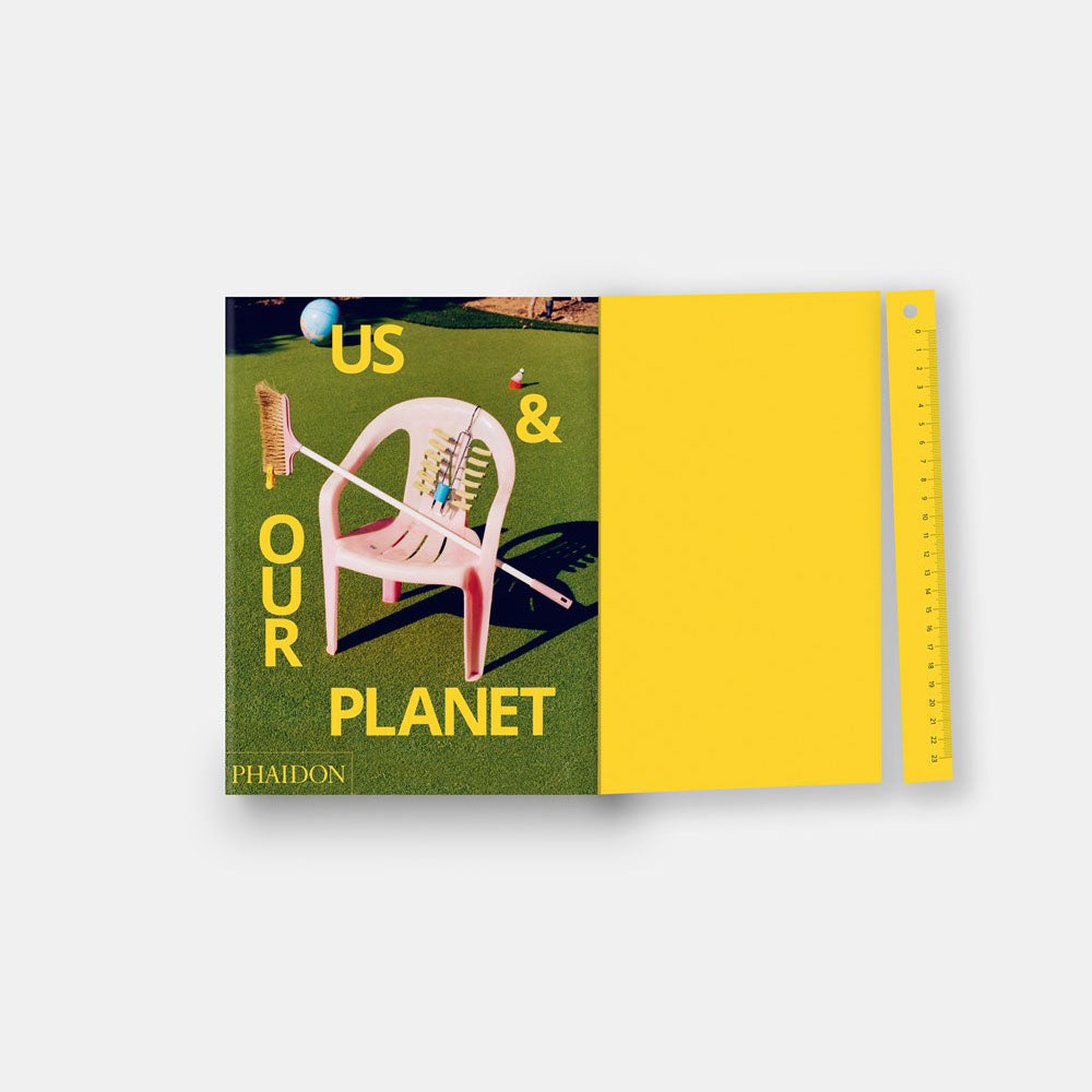 Us and Our Planet&#39;s front cover, dust jacket, and ruler.